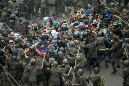 Guatemalan security forces break up US-bound migrant caravan.jpg