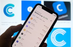 Coinbase wows in Nasdaq debut amid cryptocurrency frenzy.jpg