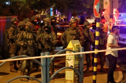 Israel launches manhunt after attack kills three.jpg