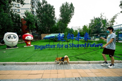 Xi's 'Chinese Dream' flickers in one Beijing neighbourhood.jpg
