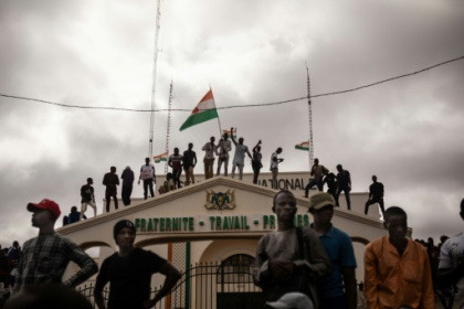 Ousted Niger leader calls for help as junta warns against intervention.jpg