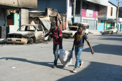 Haiti works at govt transition as gang leader vows to fight on.jpg