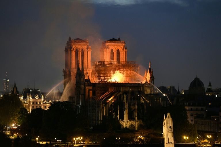 France's Macron honours craftspeople who rebuilt Notre Dame