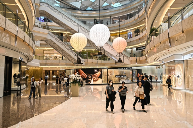 Beijing consumers mull spending habits as 'worrying' tariffs kick in