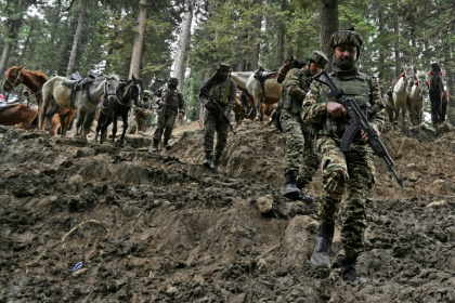 Indian soldiers are scouring the region for the attackers who killed 26 men on Tuesday