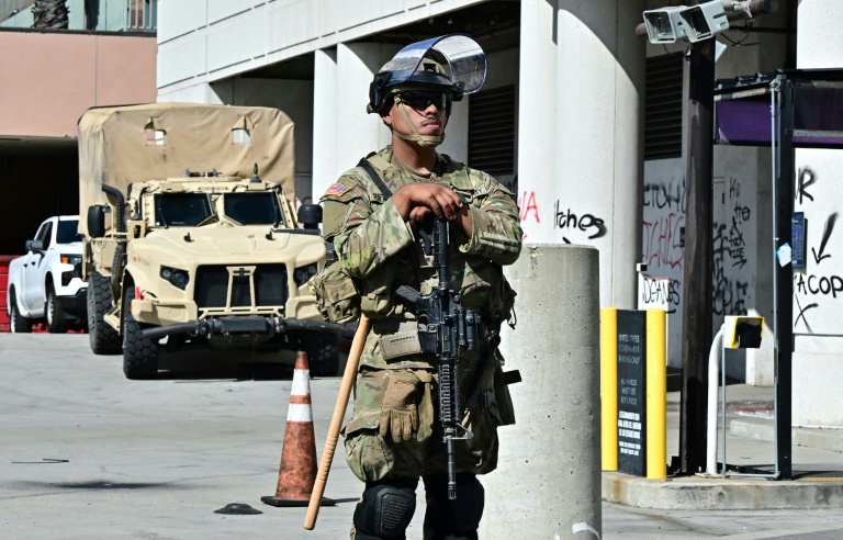 Curfew lifted in LA as Trump battles for control of California troops