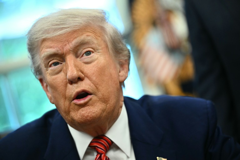 Trump says Putin 'playing with fire' as sanctions pressure grows