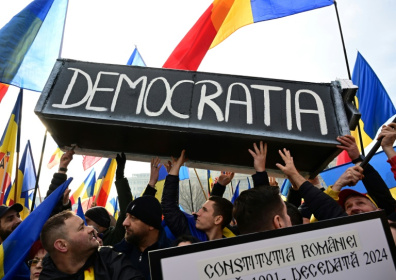 Thousands have protested the annulling of the initial vote, denouncing what they called a 'coup' - Daniel MIHAILESCU (AFP)