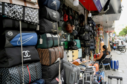 Communist-run Vietnam is a manufacturing powerhouse that produces clothing and footwear for international brands - Nhac NGUYEN (AFP)