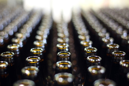 Drinks in glass bottles had five to 50 times more microplastic fragments than in plastic bottles - JOHN MOORE (AFP)