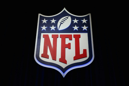 An arbitrator's ruling reportedly has found the NFL encouraged teams to reduce guaranteed contracts for veteran players in 2022 - Tim Bradbury (AFP)