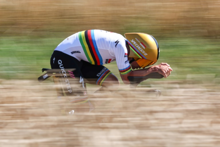 Pogacar plays down yellow jersey after Evenepoel wins Tour time trial