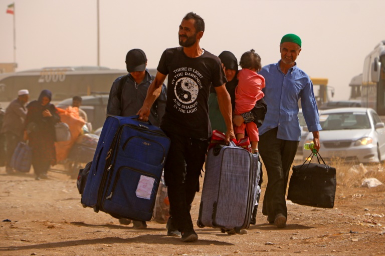 'Emergency' at Afghan border as migrant returns from Iran surge ahead of deadline