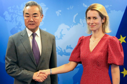China's top diplomat Wang Yi (L) held talks in Brussels ahead of a leaders' summit later this month - François WALSCHAERTS (AFP)