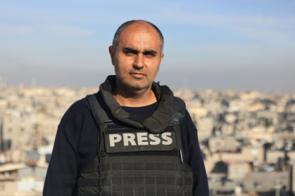 AFP video journalist Youssef Hassouna, pictured here in January 2024, says his main difficulty is accessing food to feed himself and his family - Mahmud Hams (AFP)