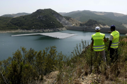 The so-called 'floatovoltaic' panels protect the water surface from the blazing sun and absorb its light to generate electricity - Abdel Majid BZIOUAT (AFP)