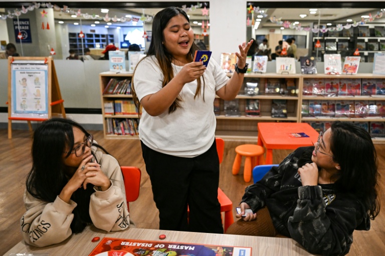 Filipinos master disaster readiness, one roll of the dice at a time