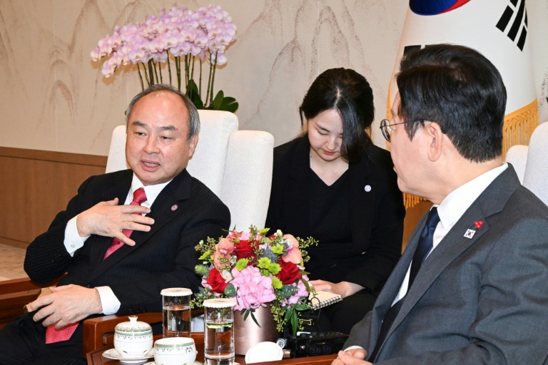 Softbank's Son says super AI could make humans like fish, win Nobel Prize
