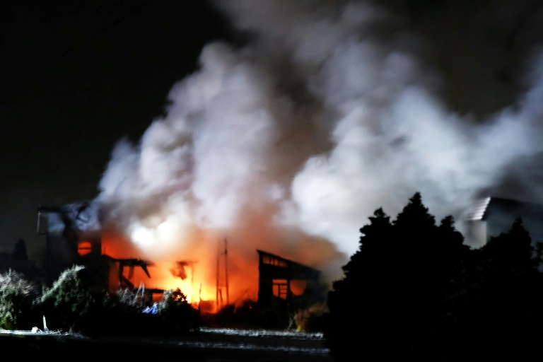 Major Japan quake injures 30, damages roads