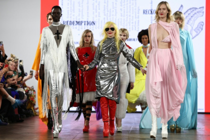 British designer Pam Hogg (C) presented her first fashion collection in 1981 - HENRY NICHOLLS (AFP)
