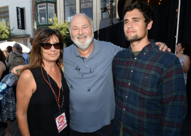 Nick Reiner, seen with Rob and Michele Reiner in 2013, has been arrested on suspicion of killing his parents - Michael Buckner (AFP)