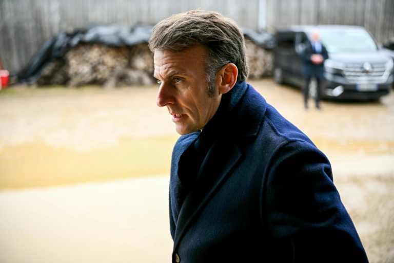 Macron says work under way to resume contact with Putin