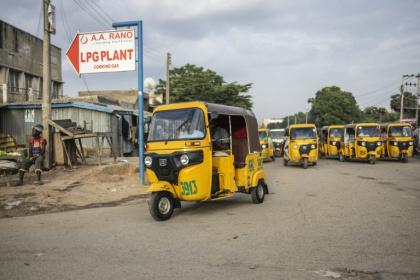 Yellow petrol-powered rickshaws, largely imported from India, have become the main form of transportation for Kano's population - OLYMPIA DE MAISMONT (AFP)