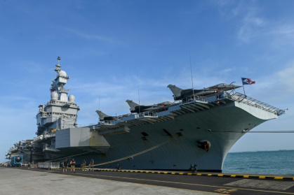Macron has ordered France's Charles de Gaulle aircraft carrier to the Mediterranean and a frigate and air-defence units to Cyprus - Roslan RAHMAN (AFP)